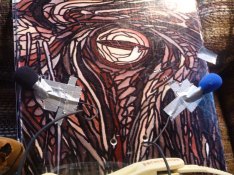 mics attached to back of the board (and pointed back to alleviate wind noise)